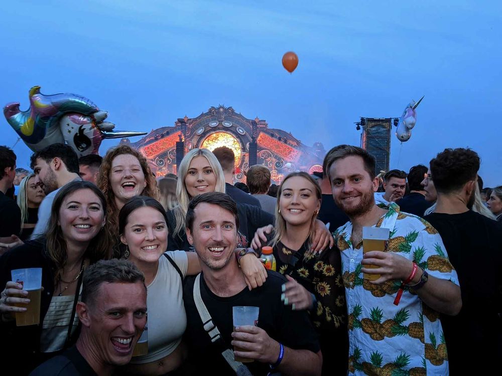 The group in front of the main stage at Tomorrowland festival in Belgium